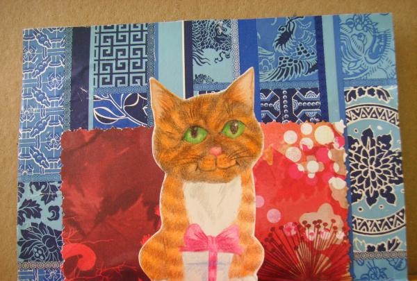cartão postal com um gato tridimensional