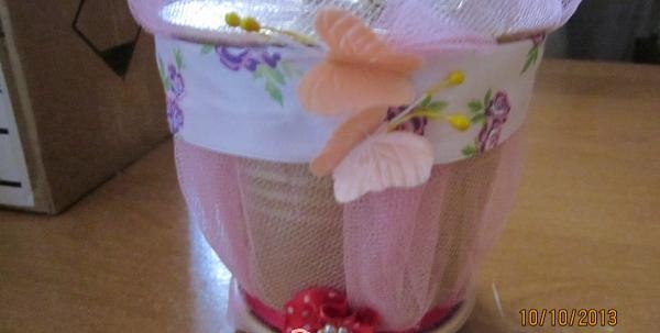 decorated with fabric flowers and butterflies