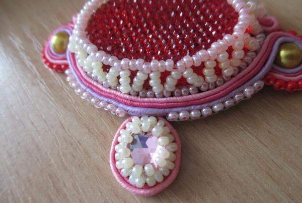 Sew on a row of beads
