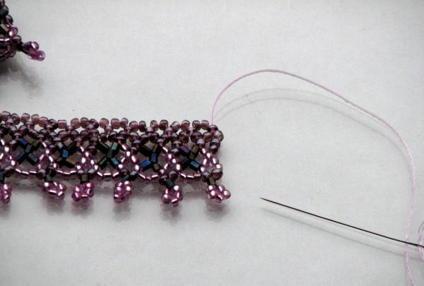 Attach a clasp to the ends of the threads