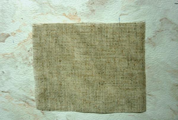 Cut a square from burlap