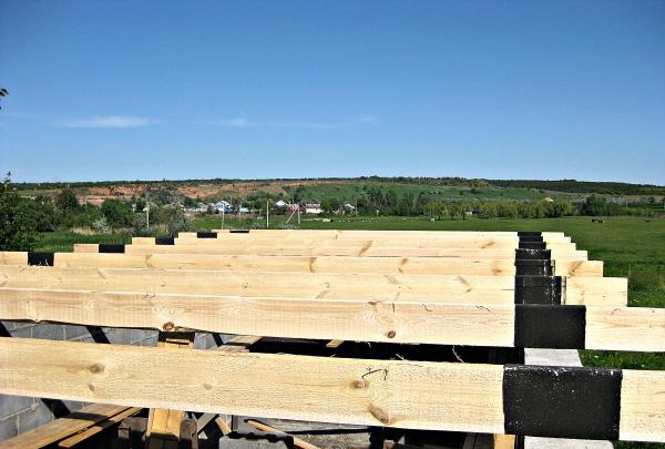 We wrap the beam with roofing felt