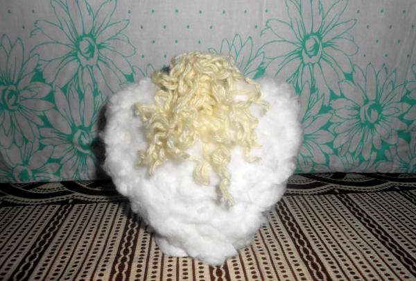 Anjo feito de almofadas de algodão