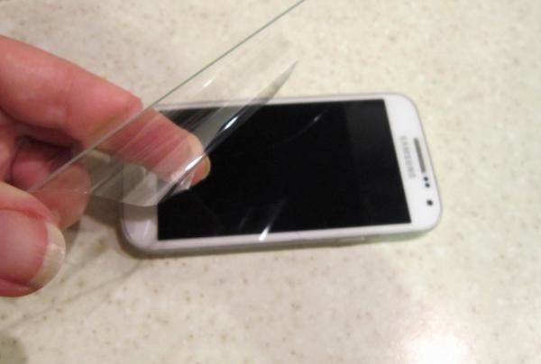 how to stick protective glass on your phone
