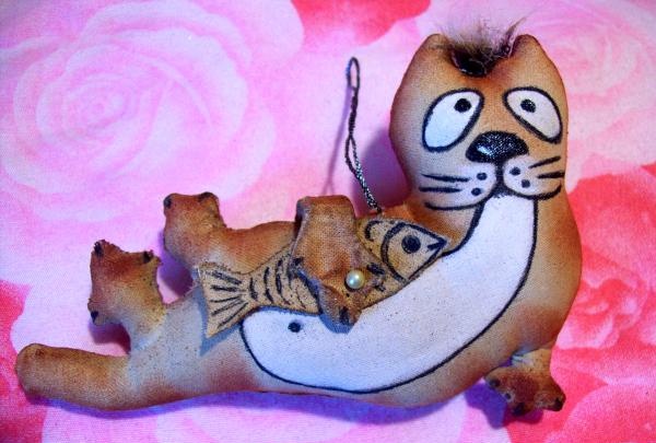 pêcheur de chat de jouet de café