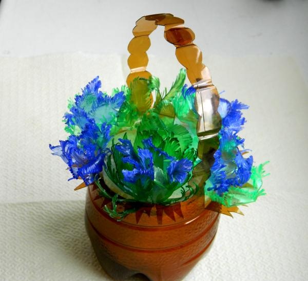 Basket with a bouquet of plastic bottles