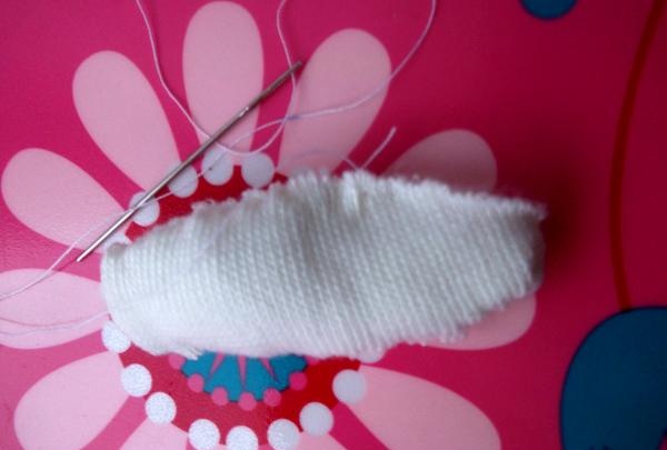 Gato fragante de un calcetín