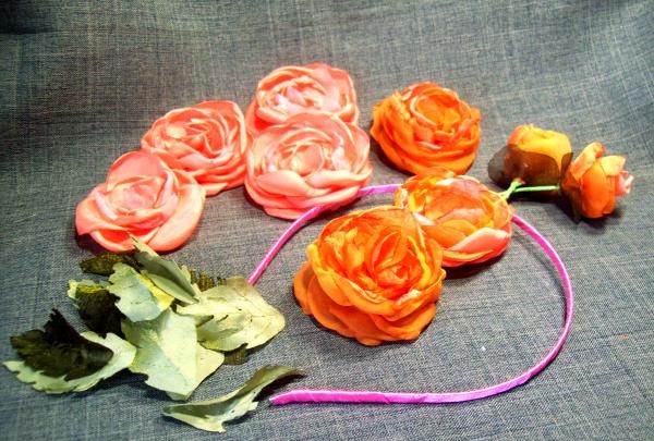 brooch with a headband with silk flowers