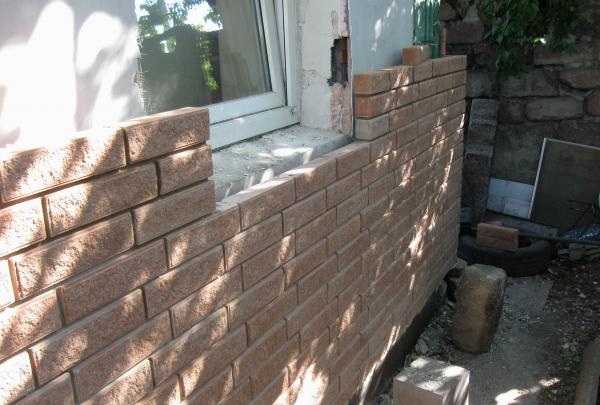 Afslutning af huset med mursten
