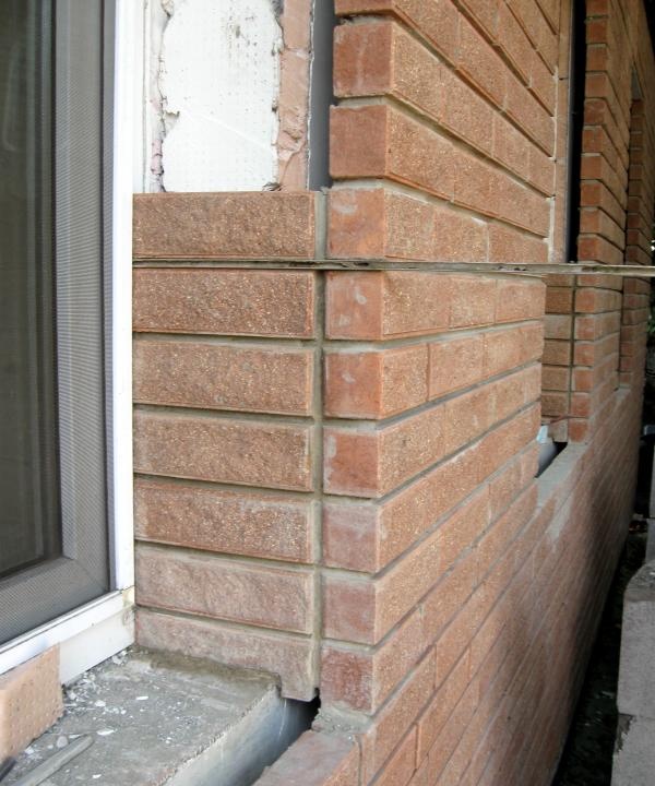 Finishing the house with facing bricks