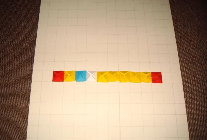 Gallet utilitzant la tècnica del mosaic d'origami