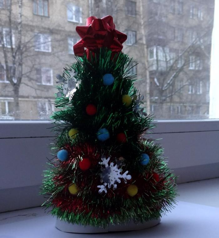 Kerstboom gemaakt van klatergoud
