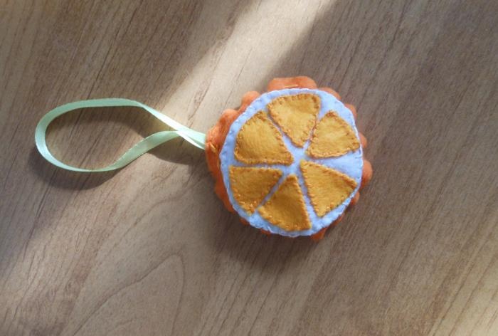 New Year's orange felt pendant