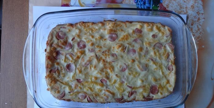 The most delicious pie with sausages and cheese