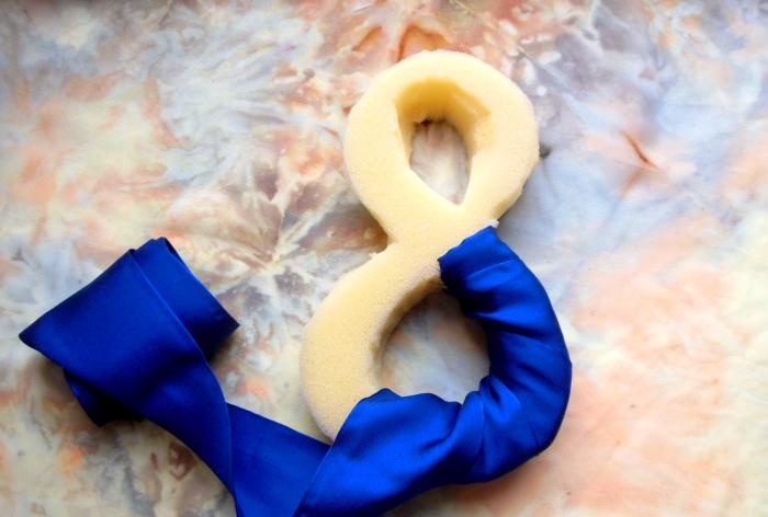 Figure eight made of foam rubber and satin ribbons