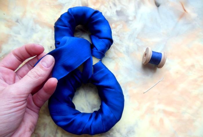 Figure eight made of foam rubber and satin ribbons