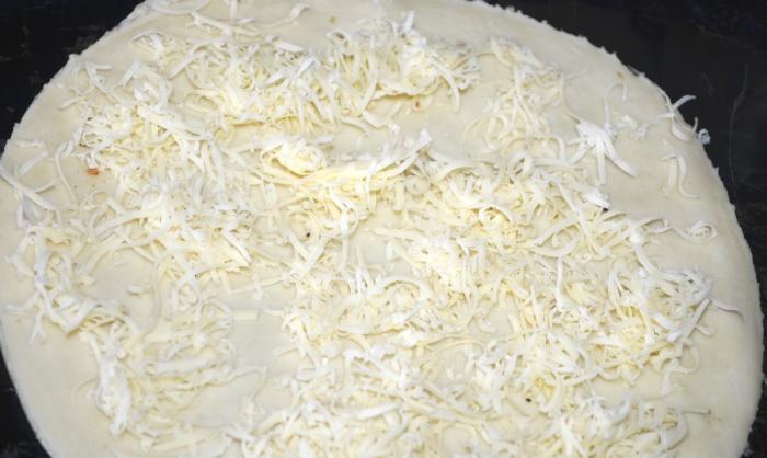 Comment faire une pizza aux quatre fromages