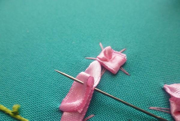 pull the needle out of the fabric