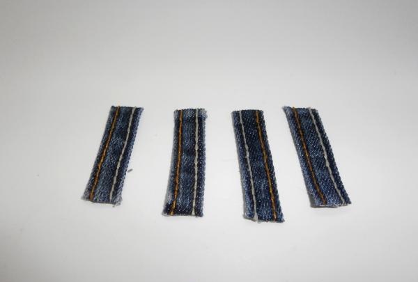 Cut from the waistband of old jeans