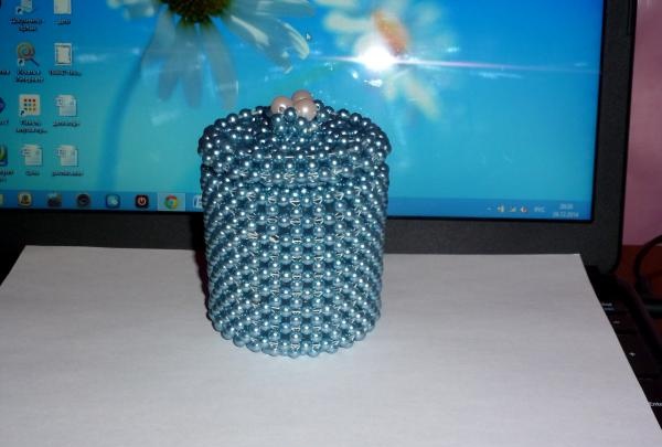 We braid the jar with beads