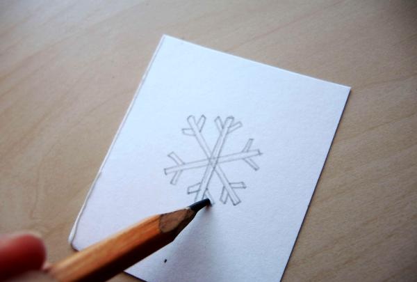 Zeichne eine Schneeflocke
