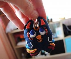 Keychain in the shape of an animal with embroidery