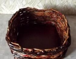 Weaving a basket from a magazine vine