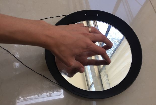 Nouveau miroir d'une vieille poêle à frire