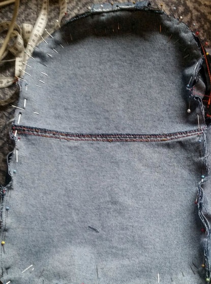 Bright backpack made from old jeans