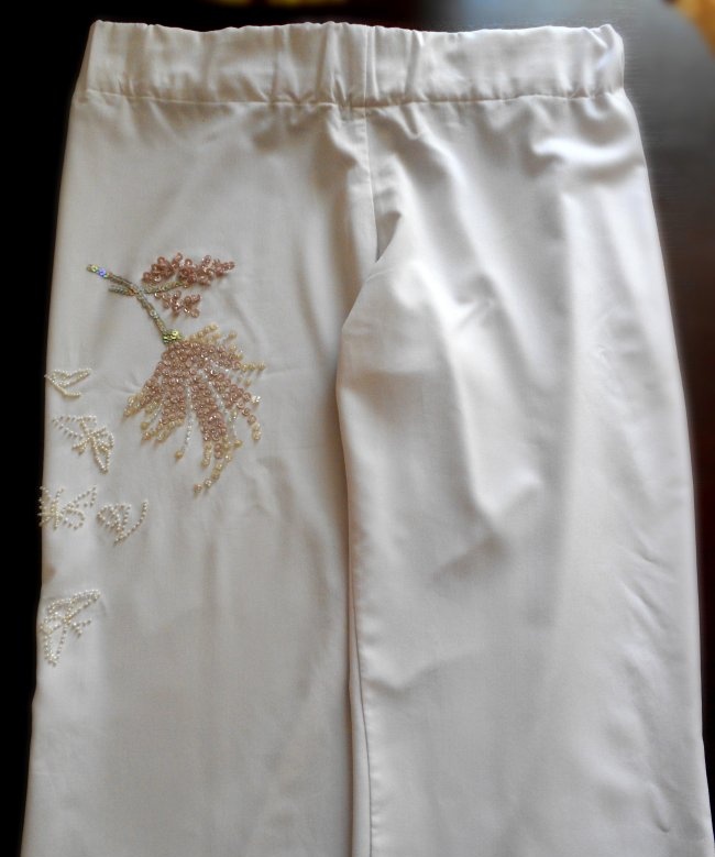 Embroidery on trousers with beads and sequins