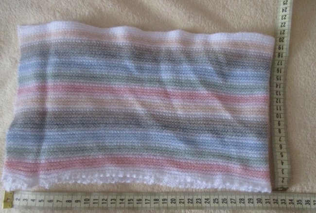 We naaien onszelf een comfortabele sjaal voor een kind