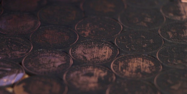 Coin floor under epoxy resin