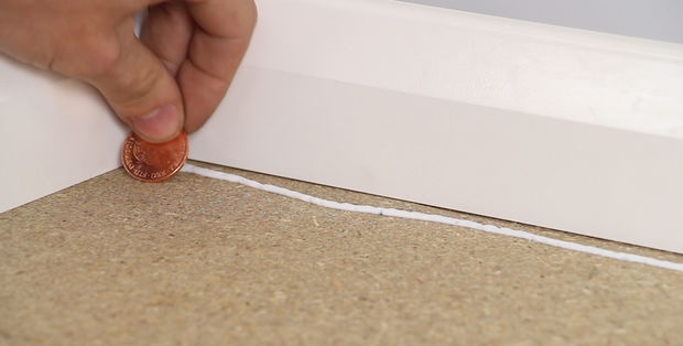 Coin floor under epoxy resin