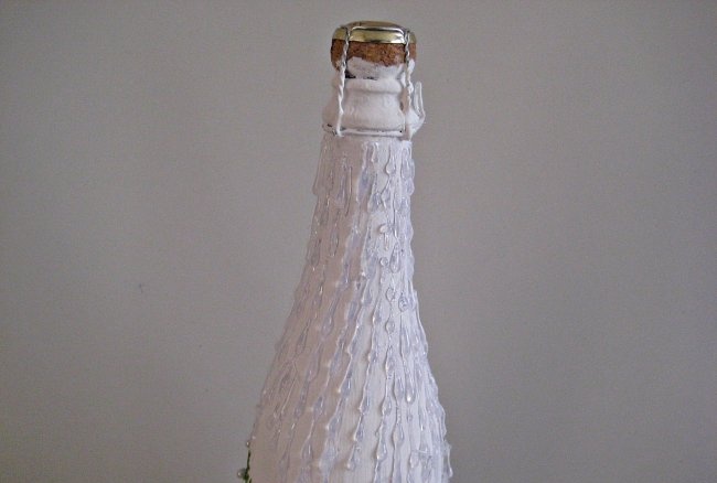 New Year's decoupage champagne bottle