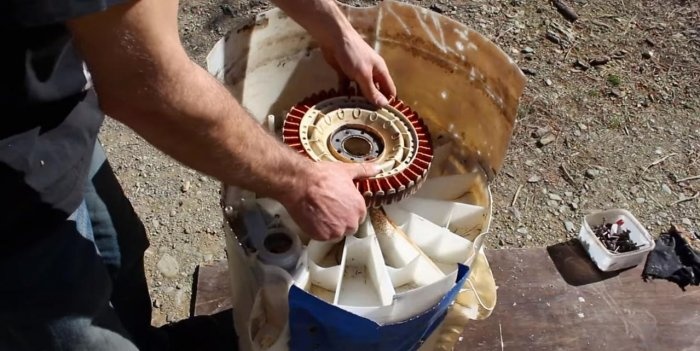 Hydro turbine electric generator from an old washing machine