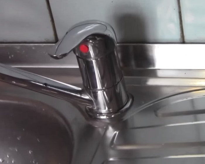The faucet is leaking, fixing the problem