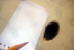 How to repair a small hole in drywall