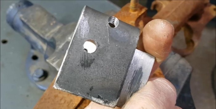 The most effective way to remove a broken stud