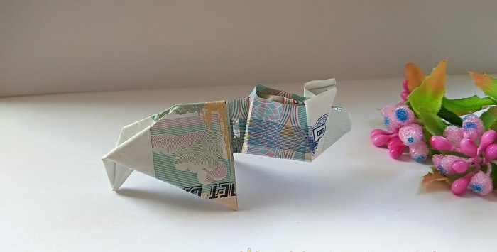 Schwein aus einer Banknote