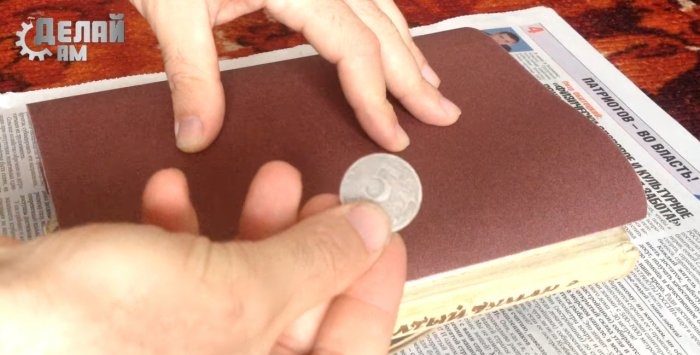 Transferring a design to a coin