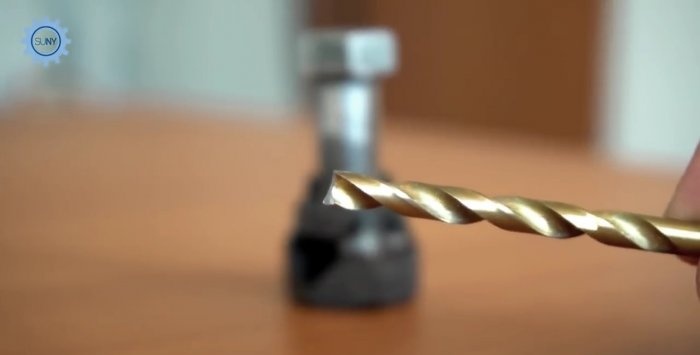 Drill sharpening device