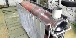 Šildymo akumuliatorius naudojant medieną iš dujų balionų