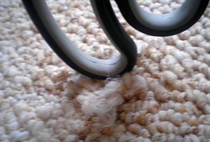 How to repair burnt carpet