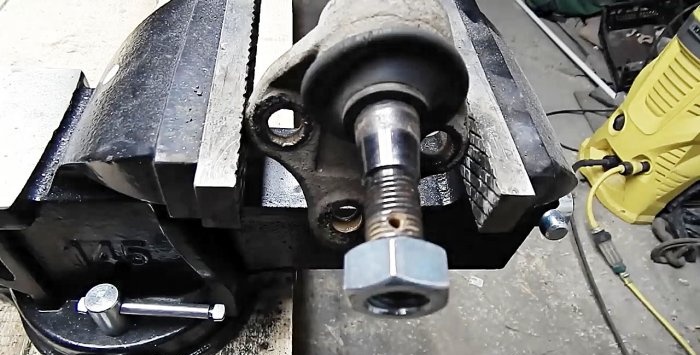 Movable bracket for attaching an angle grinder from a ball joint