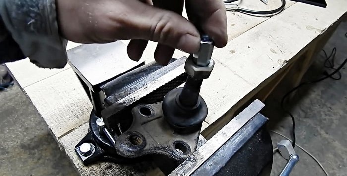 Movable bracket for attaching an angle grinder from a ball joint