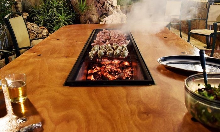 Homemade table with built-in barbecue