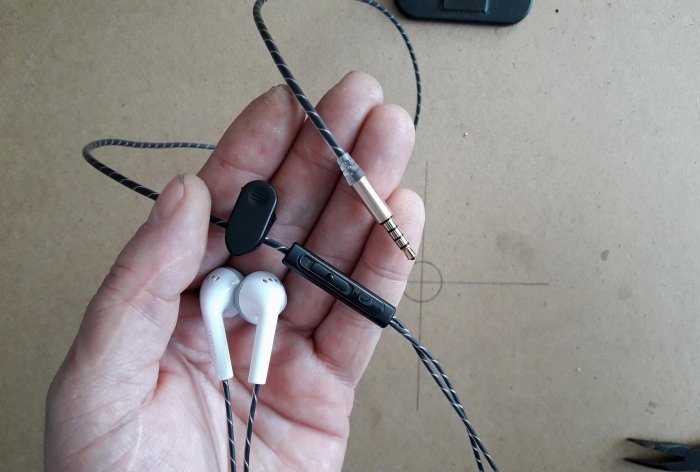 Assembling one earphone from two