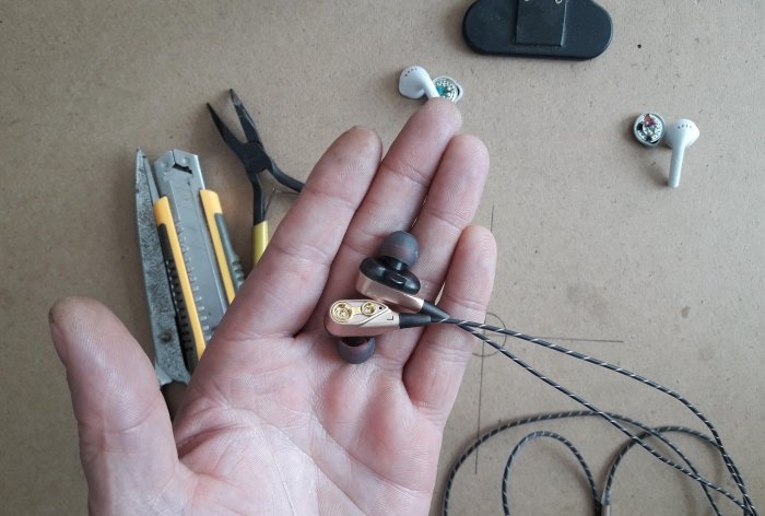 Assembling one earphone from two