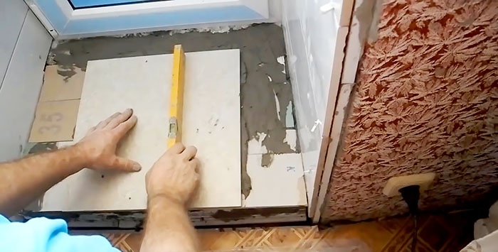 How to quickly and reliably make a threshold for a balcony from leftover plasterboard and tiles