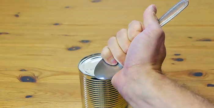 How to open a tin can with a spoon